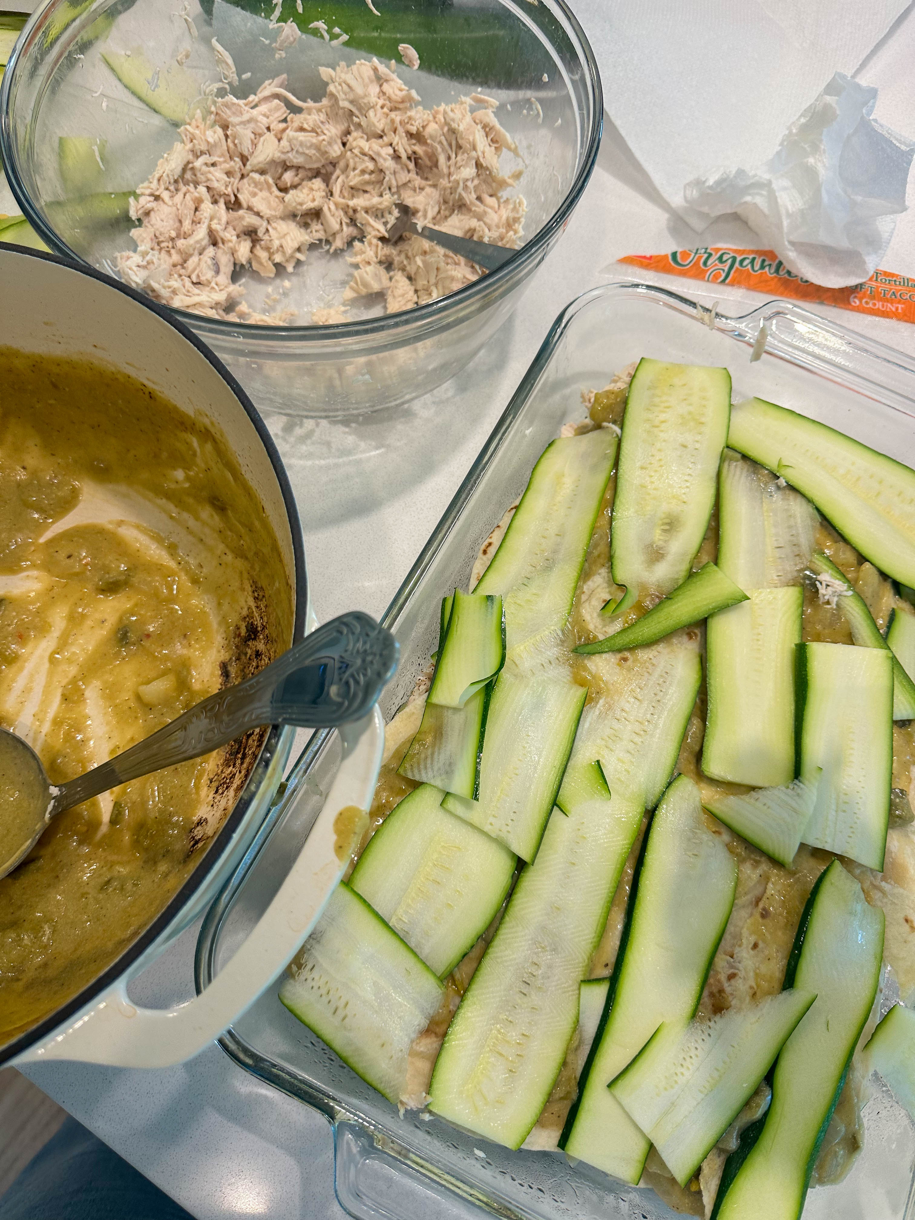 green chile chicken enchilada casserole, chicken enchilada zucchini casserole, creamy chicken enchilada casserole, green enchilada chicken bake, zucchini chicken casserole, easy chicken casserole recipe, shredded chicken casserole, healthy enchilada casserole, green chile casserole recipe, chicken zucchini bake, Mexican chicken casserole, family dinner casserole, cheesy chicken zucchini casserole, poblano chicken casserole, green chile chicken bake, low carb enchilada casserole, baked chicken enchilada casserole, easy weeknight chicken dinner, chicken tortilla casserole, creamy green chile casserole
