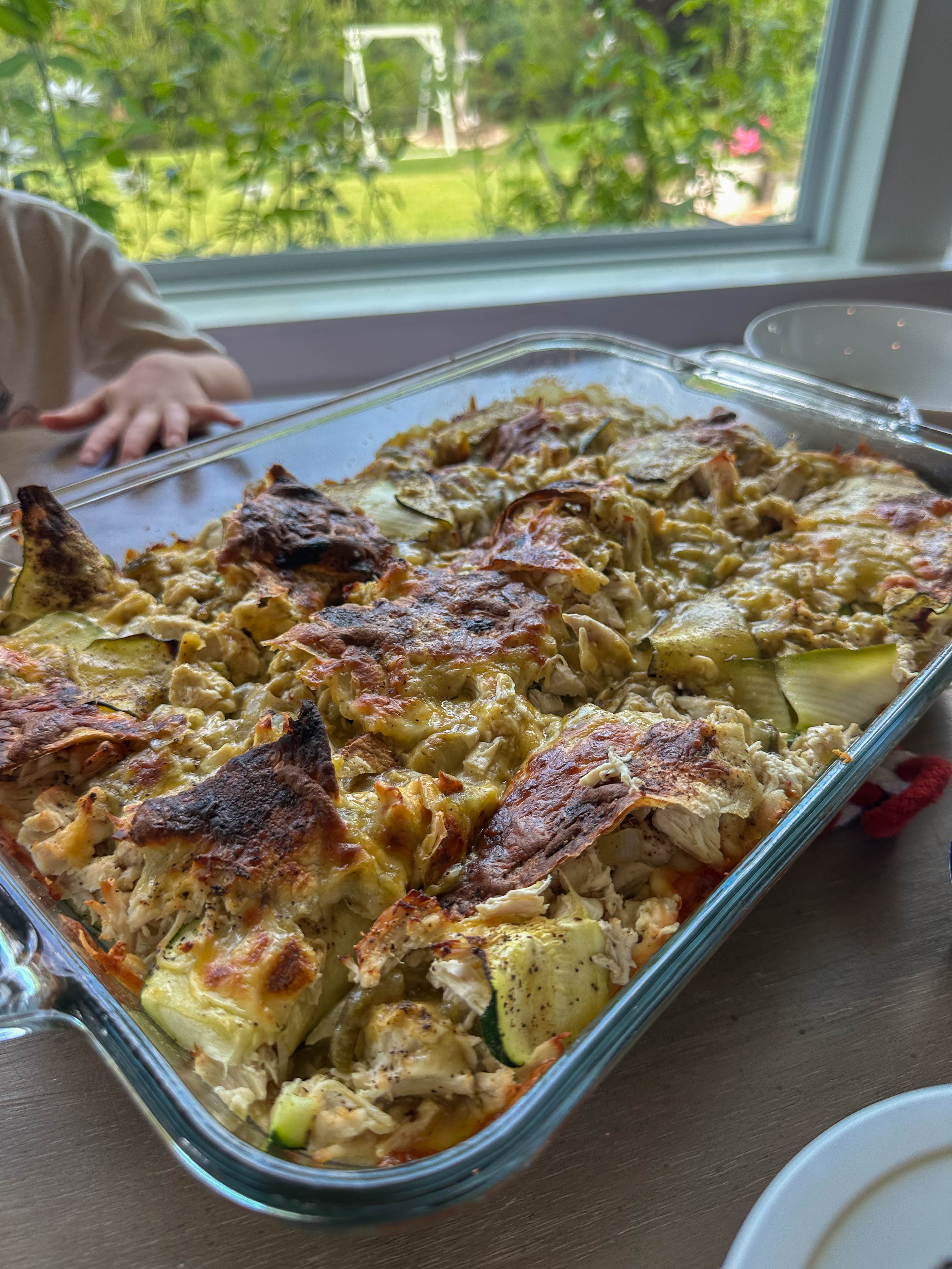green chile chicken enchilada casserole, chicken enchilada zucchini casserole, creamy chicken enchilada casserole, green enchilada chicken bake, zucchini chicken casserole, easy chicken casserole recipe, shredded chicken casserole, healthy enchilada casserole, green chile casserole recipe, chicken zucchini bake, Mexican chicken casserole, family dinner casserole, cheesy chicken zucchini casserole, poblano chicken casserole, green chile chicken bake, low carb enchilada casserole, baked chicken enchilada casserole, easy weeknight chicken dinner, chicken tortilla casserole, creamy green chile casserole