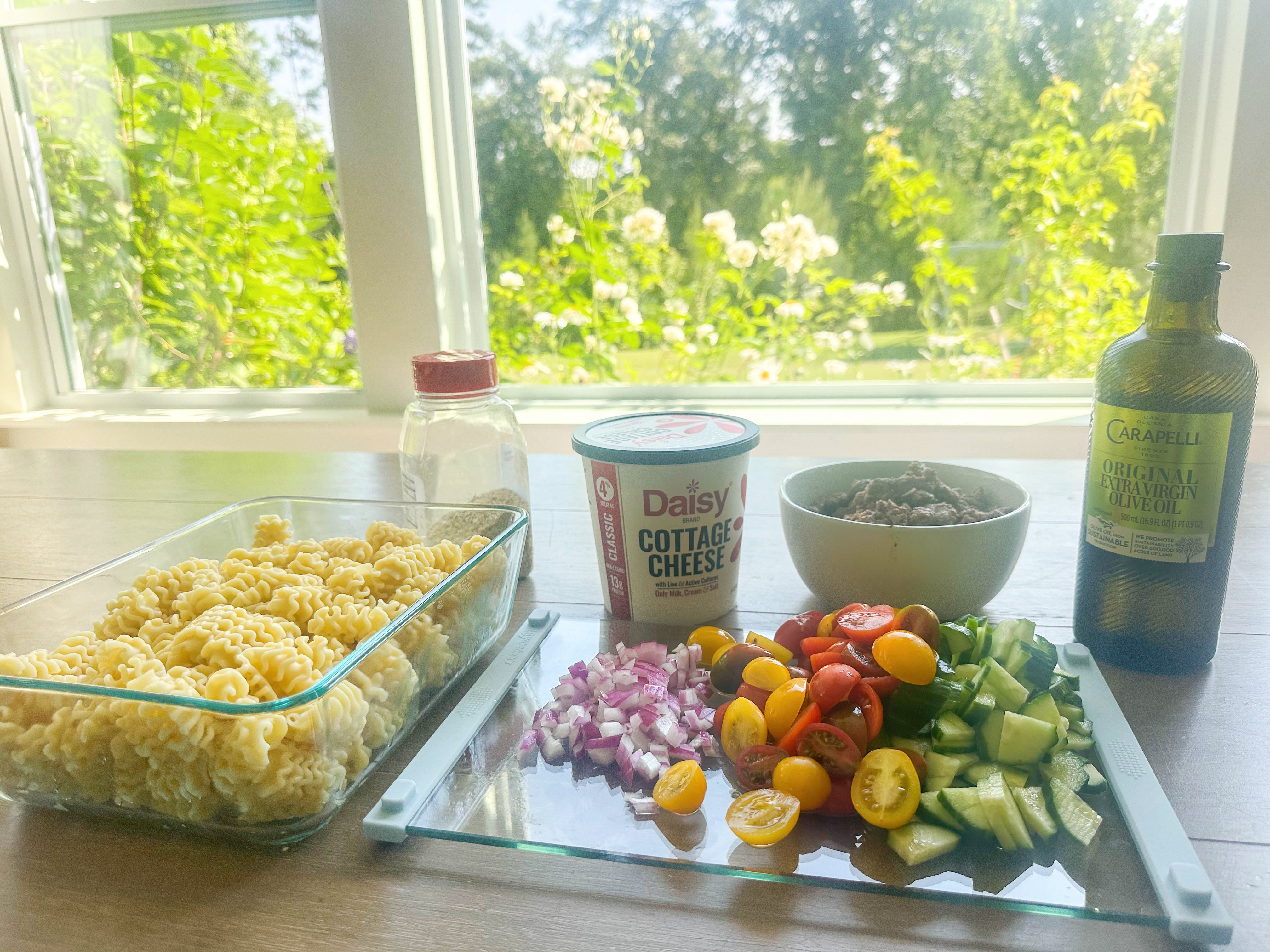 protein pasta, protein recipe, cottage cheese, ground beef, organic, poolside, fit for summer, healthy recipes, summer pasta salad, garden vegetables, fresh recipe, fresh food, what to bring to the pool, easy snack, cottage cheese pasta, ground beef pasta, arctic seasoning