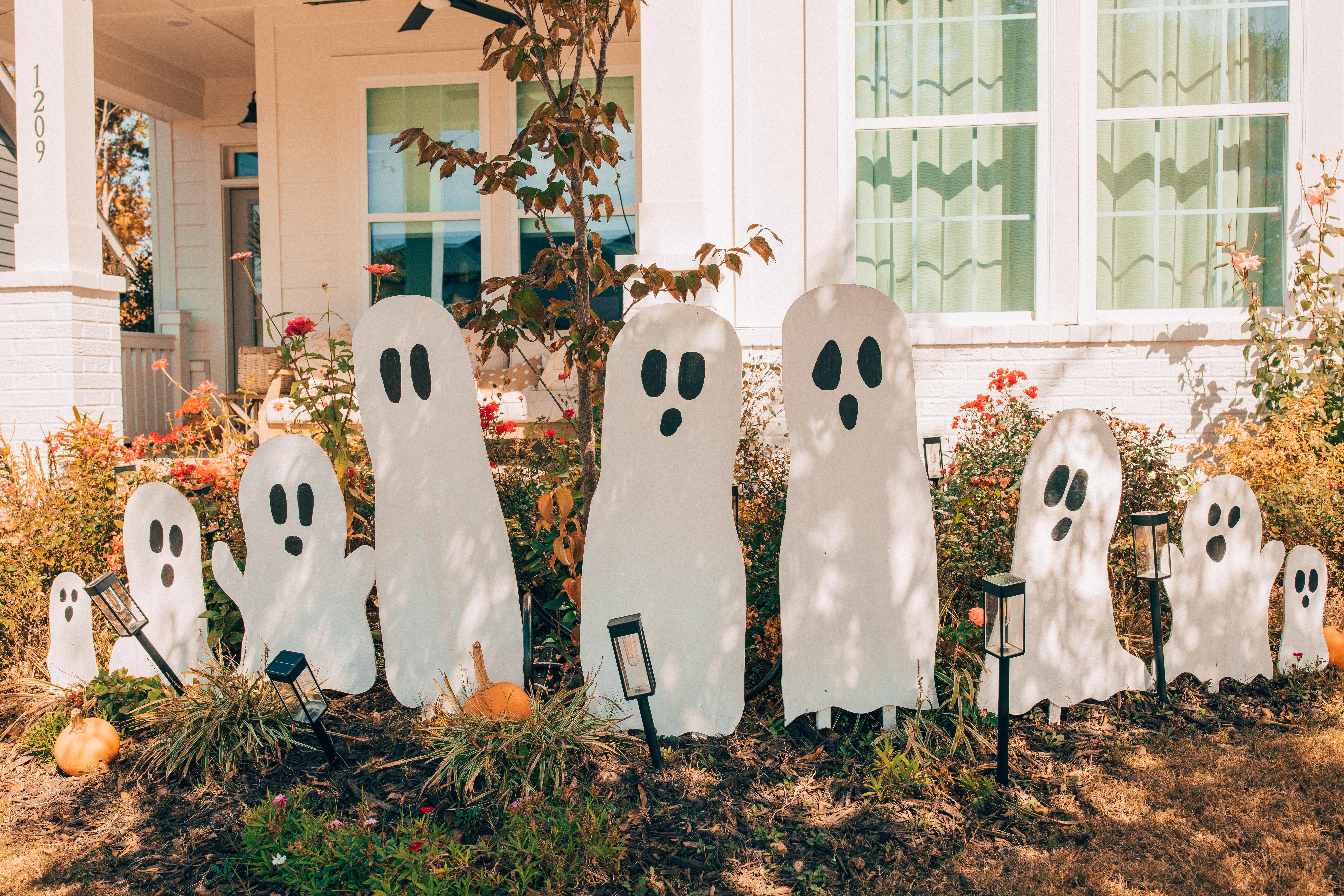 DIY wood cut out yard ghosts