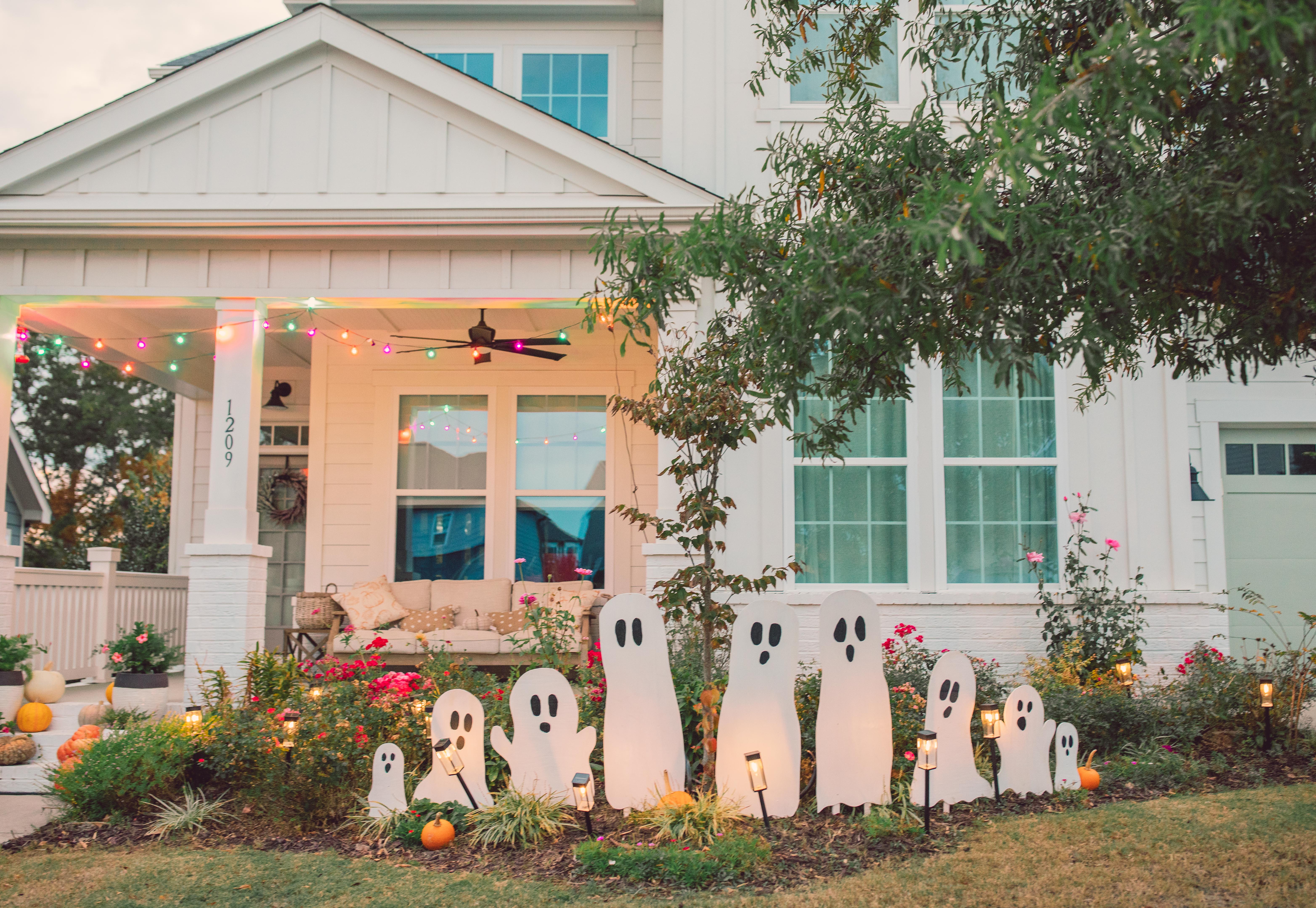 DIY wood cut out yard ghosts
