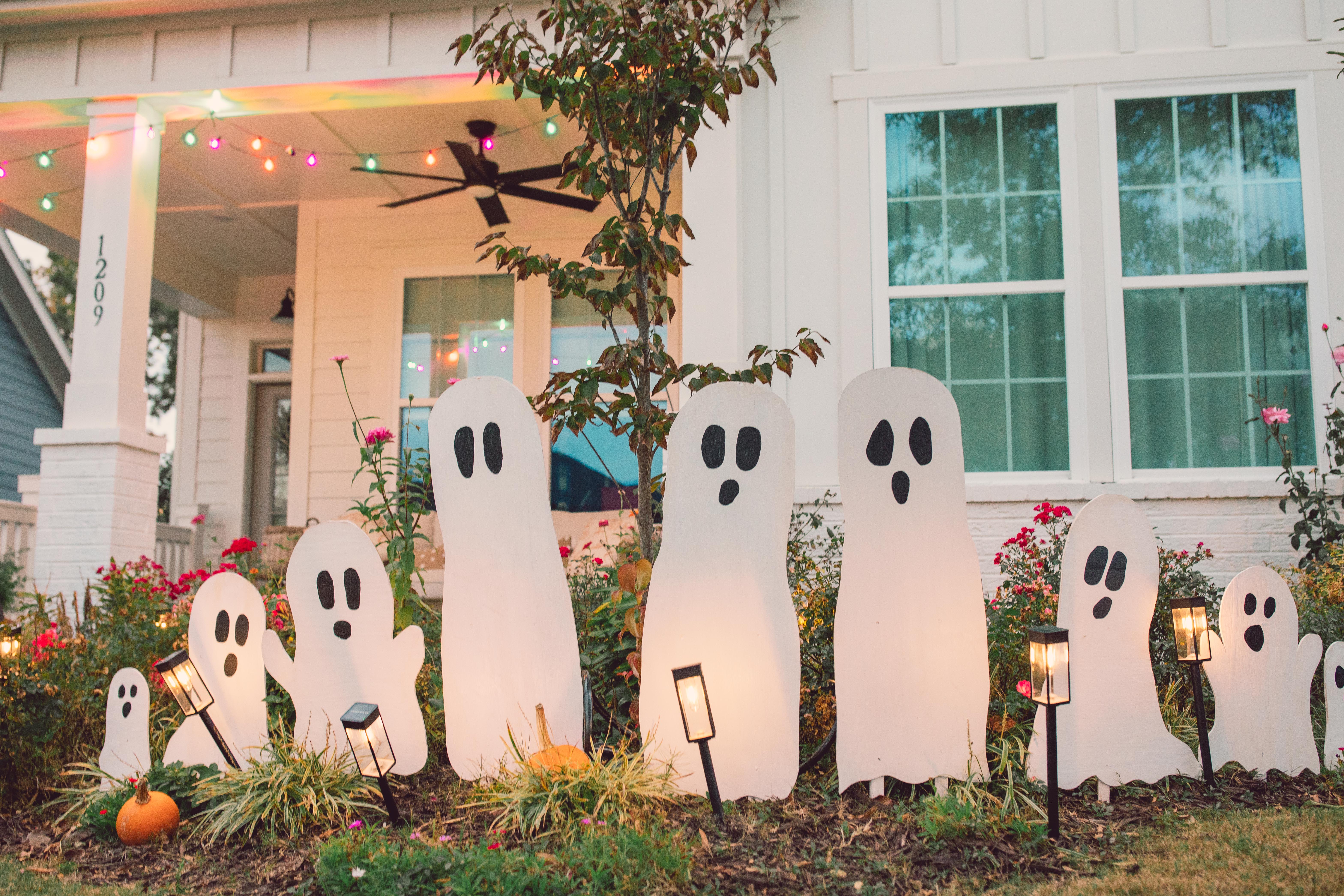 DIY wood cut out yard ghosts