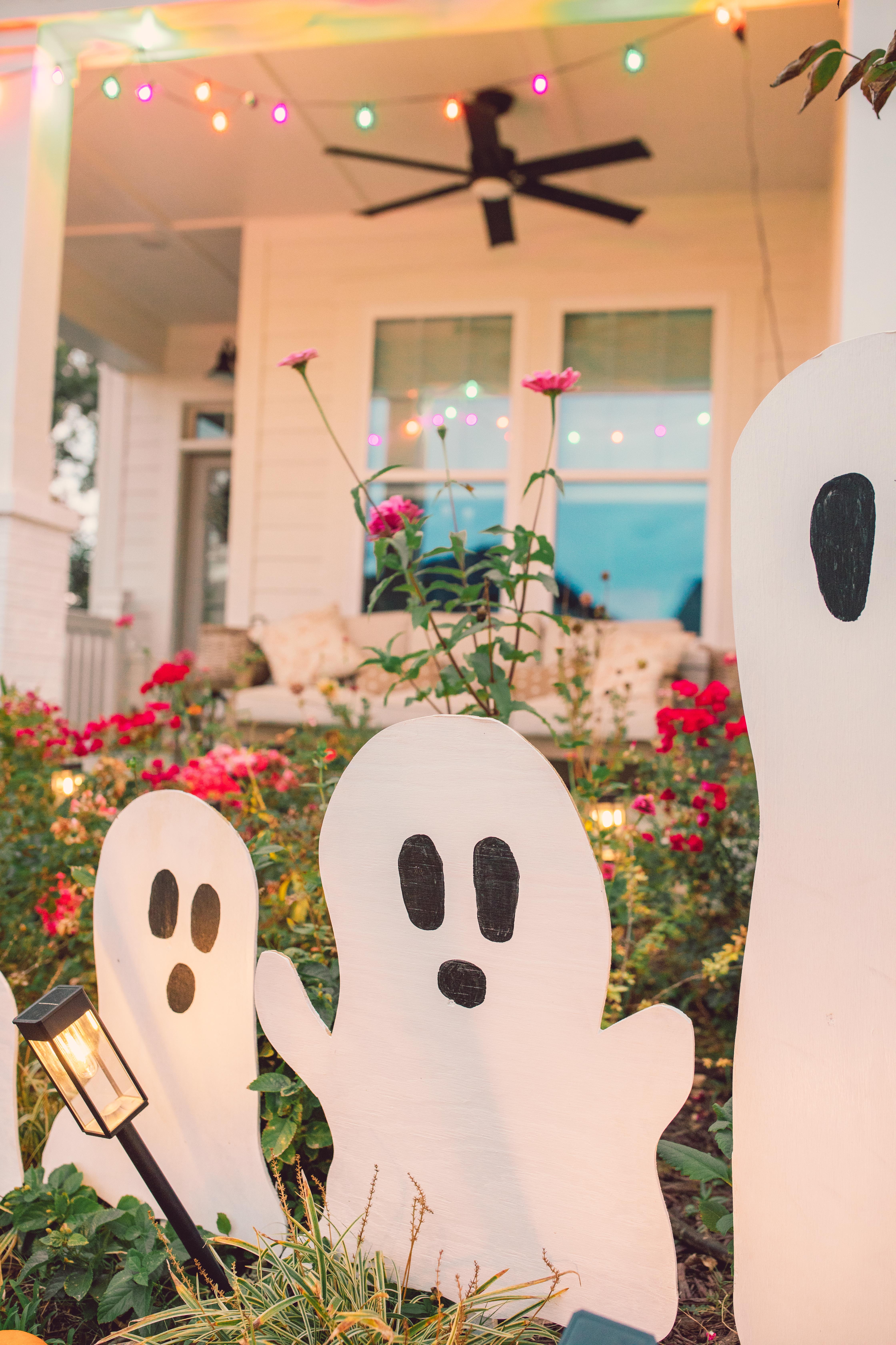DIY wood cut out yard ghosts