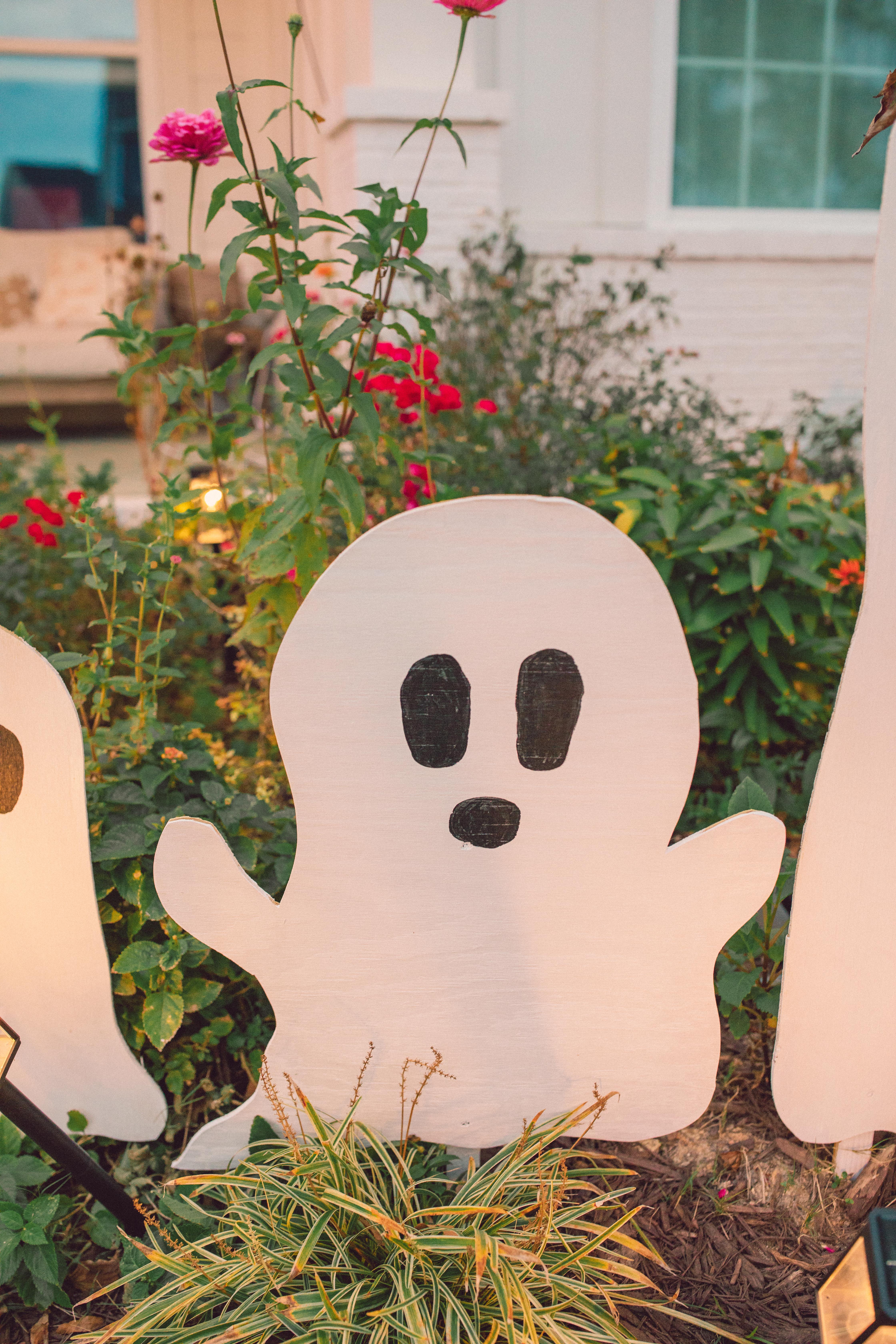 DIY wood cut out yard ghosts
