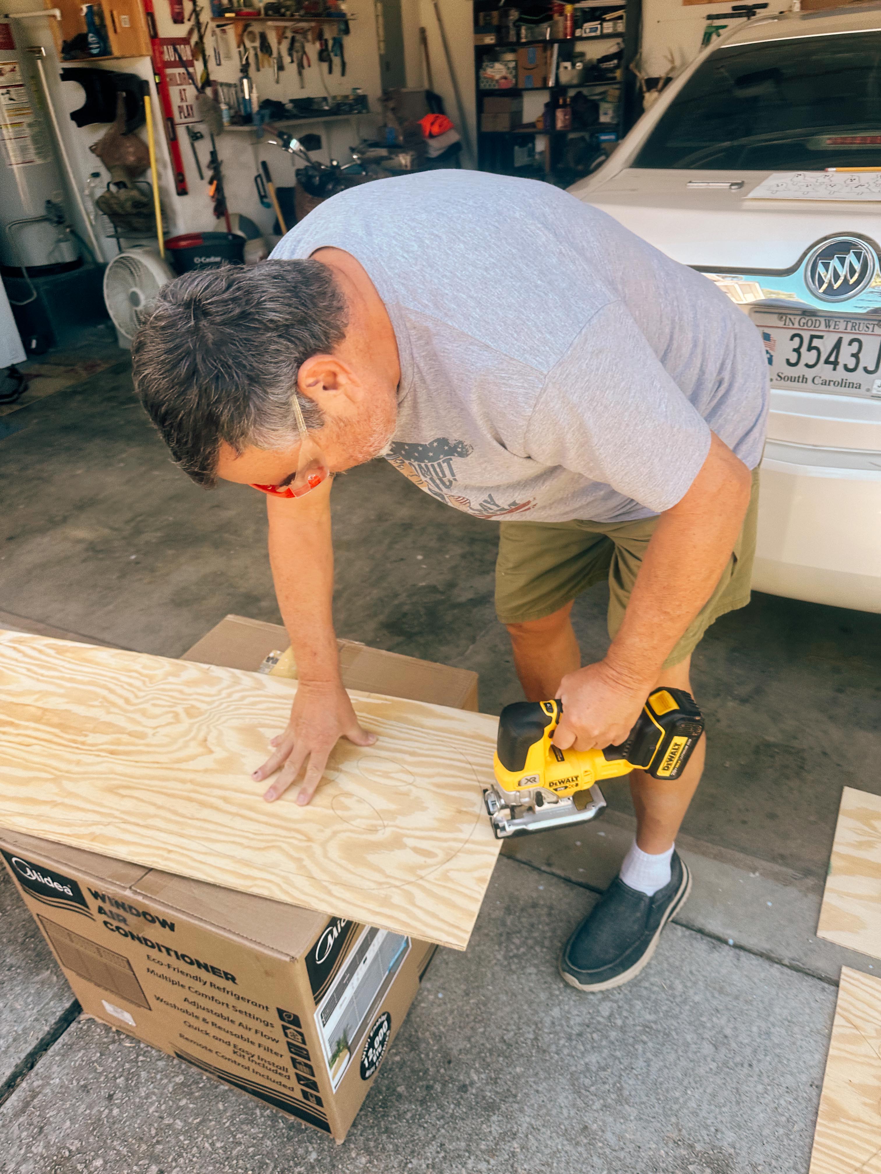 DIY wood cut out yard ghosts