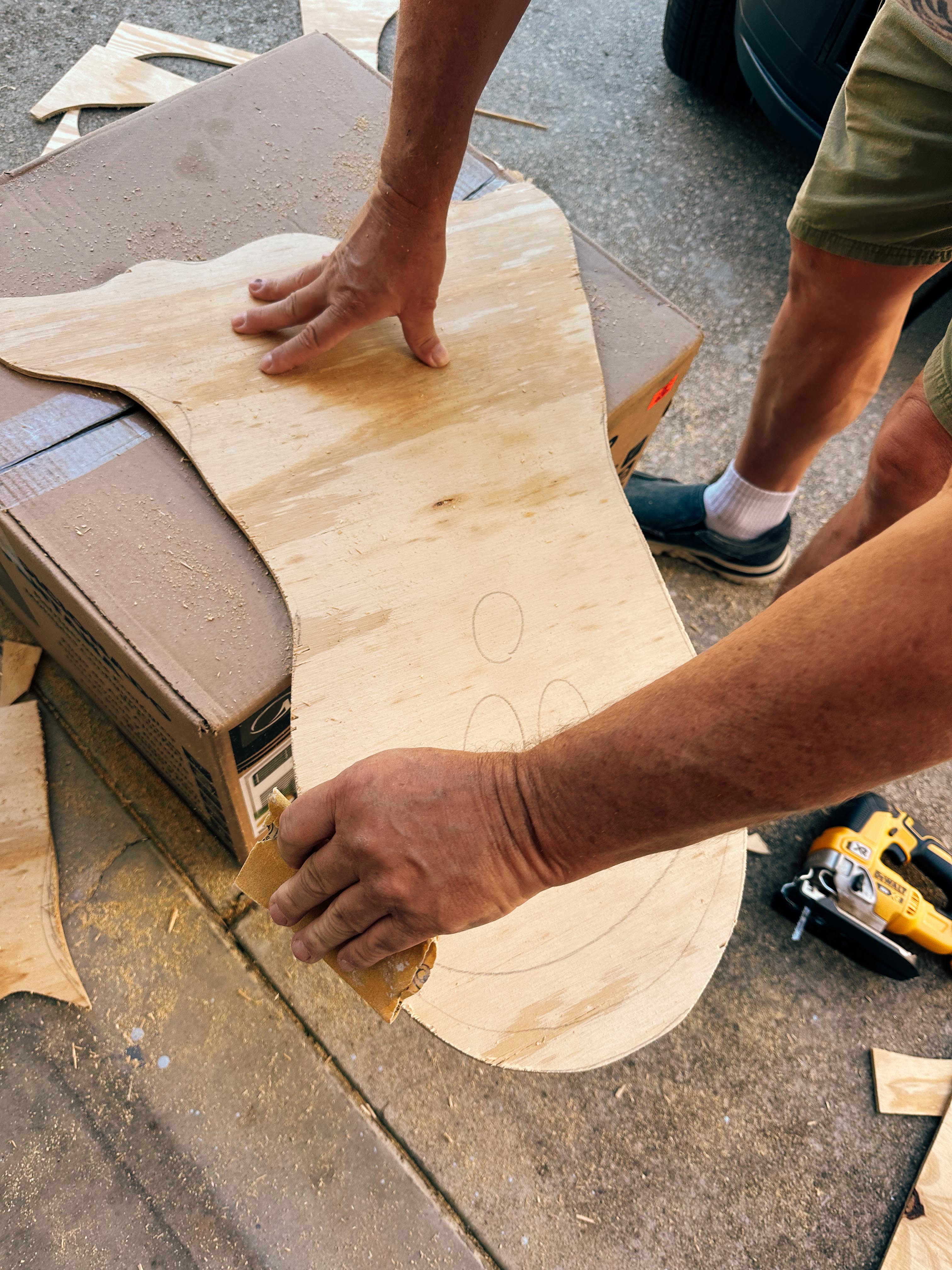 DIY wood cut out yard ghosts