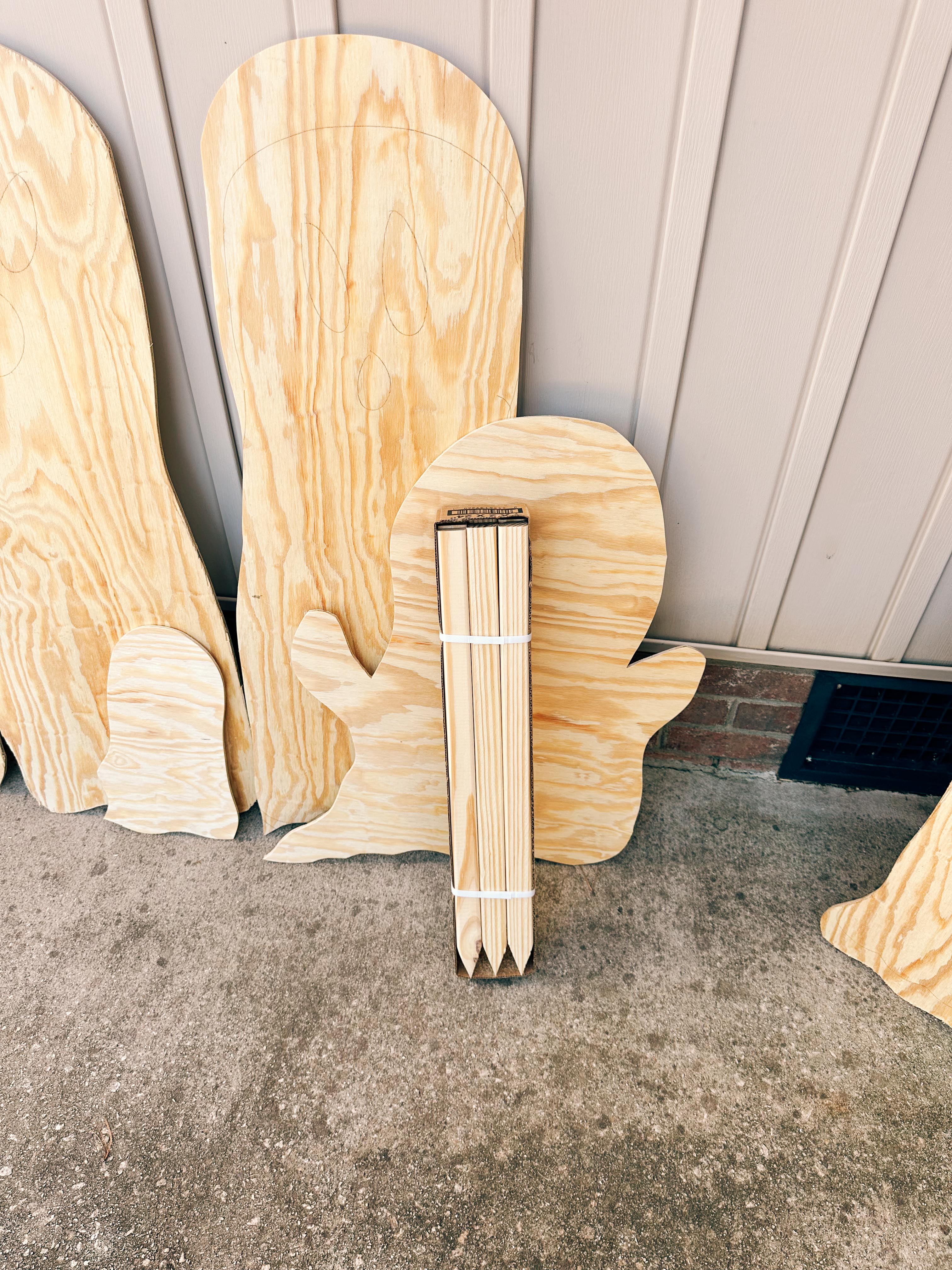 DIY wood cut out yard ghosts