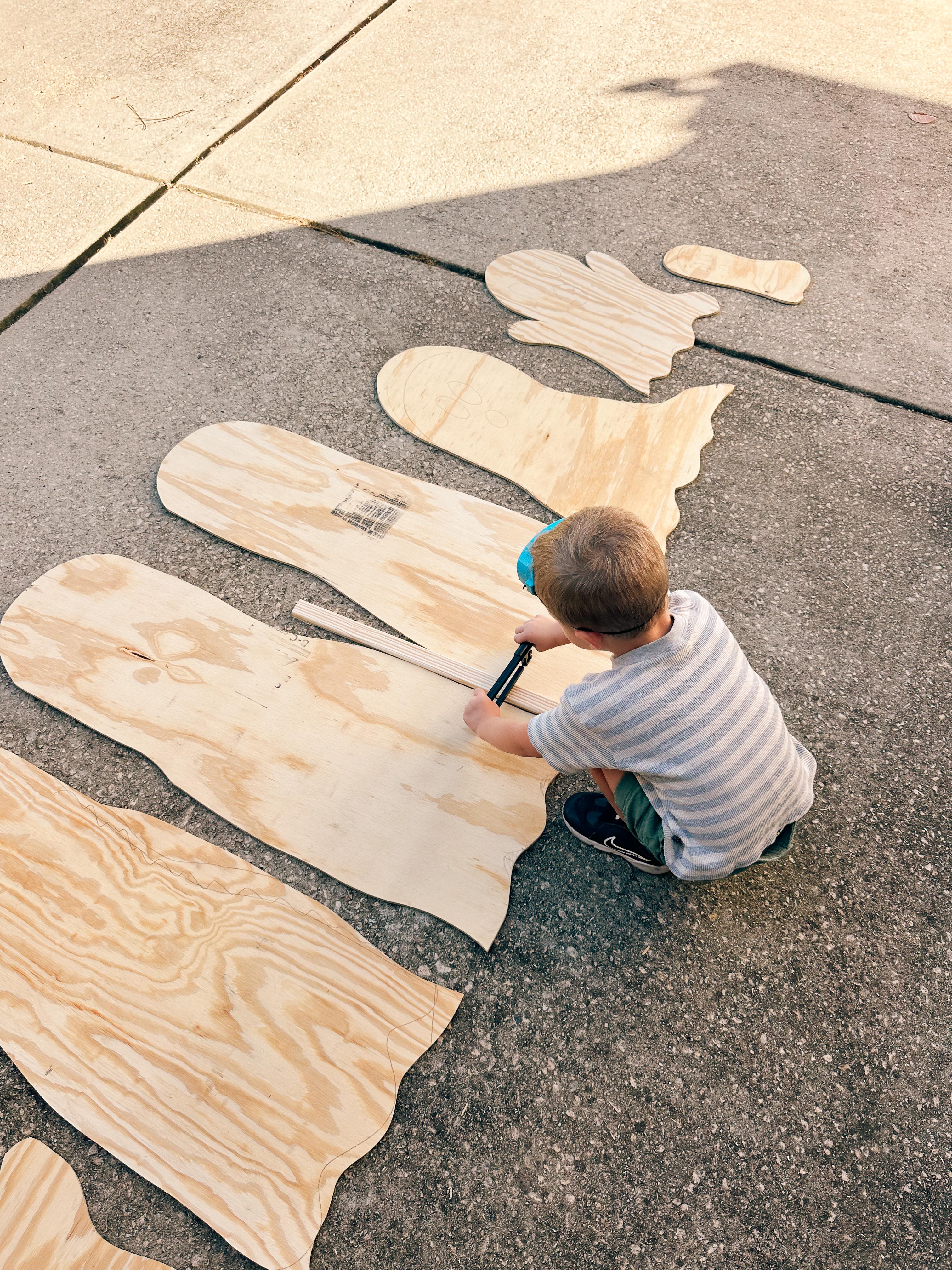 DIY wood cut out yard ghosts