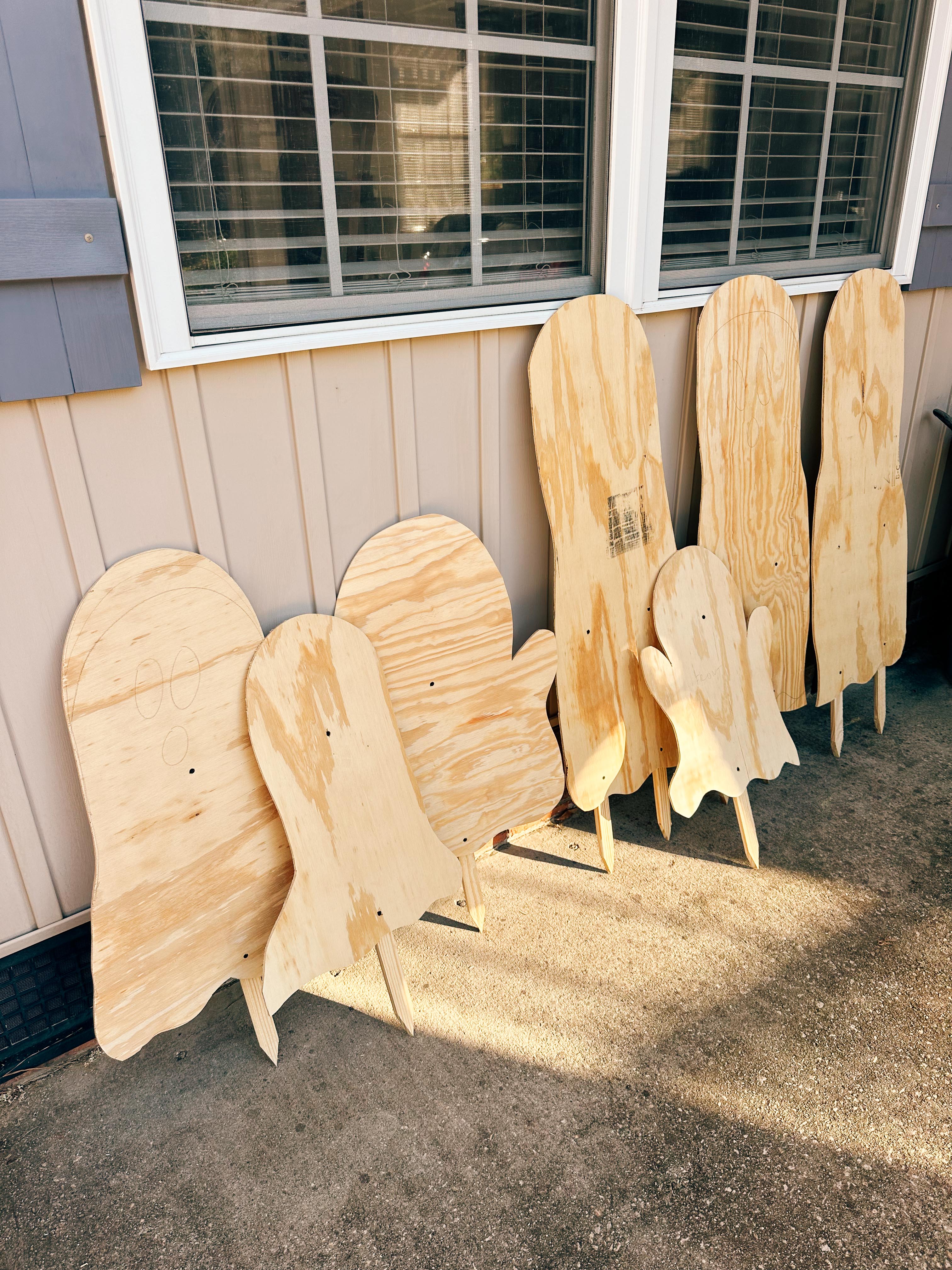 DIY wood cut out yard ghosts