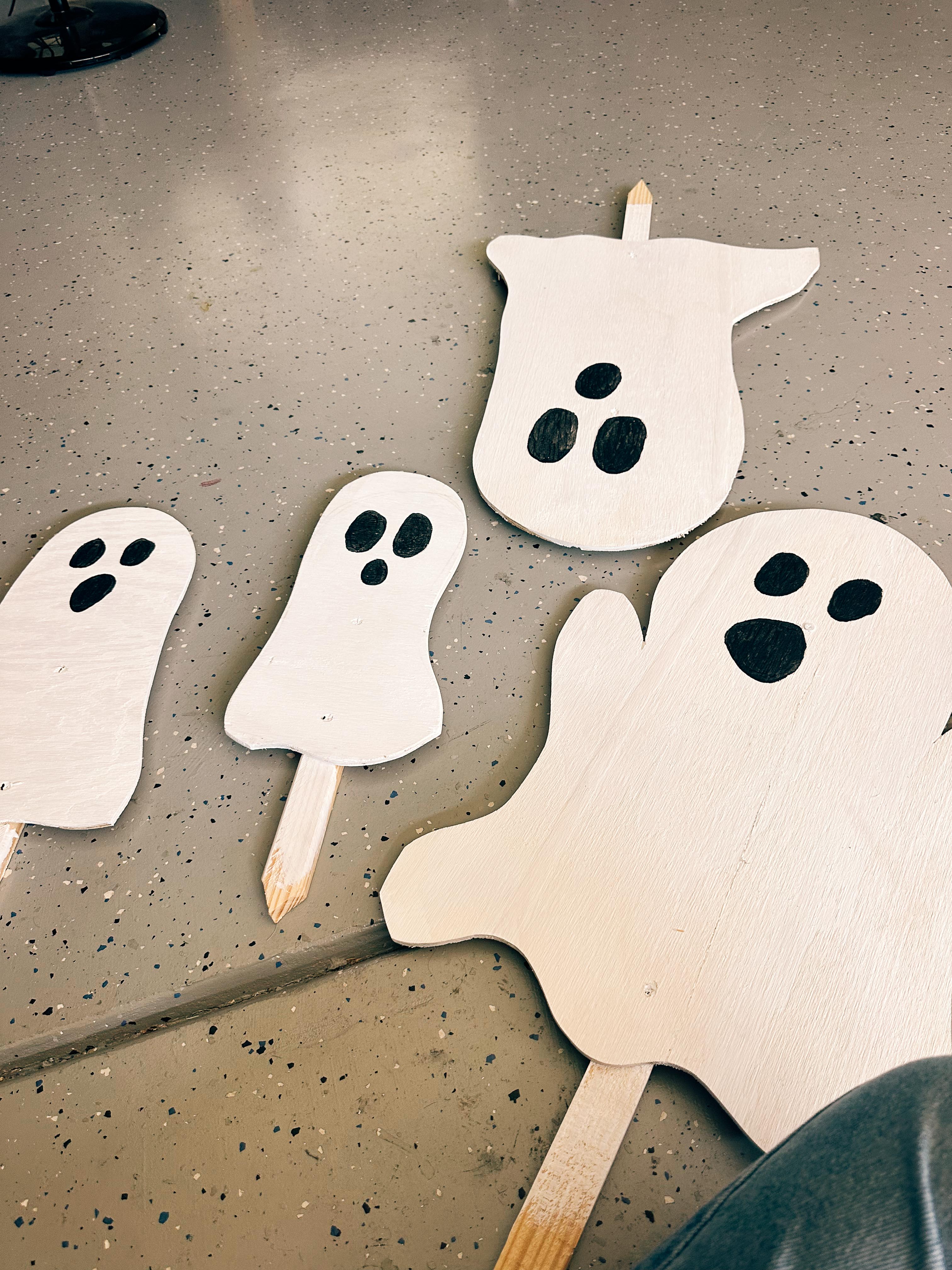 DIY wood cut out yard ghosts
