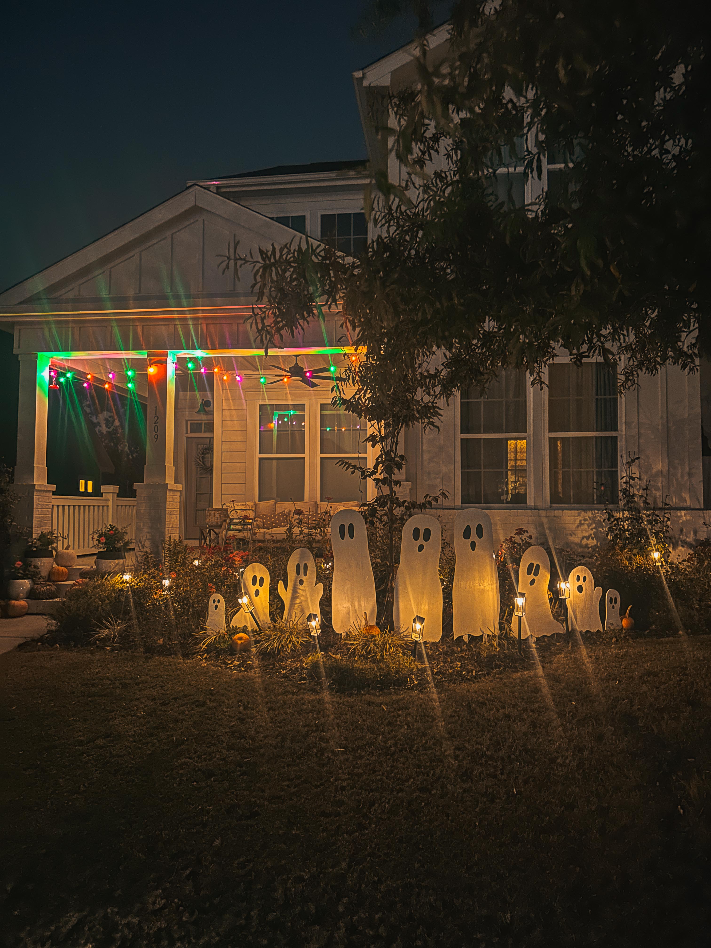 DIY wood cut out yard ghosts